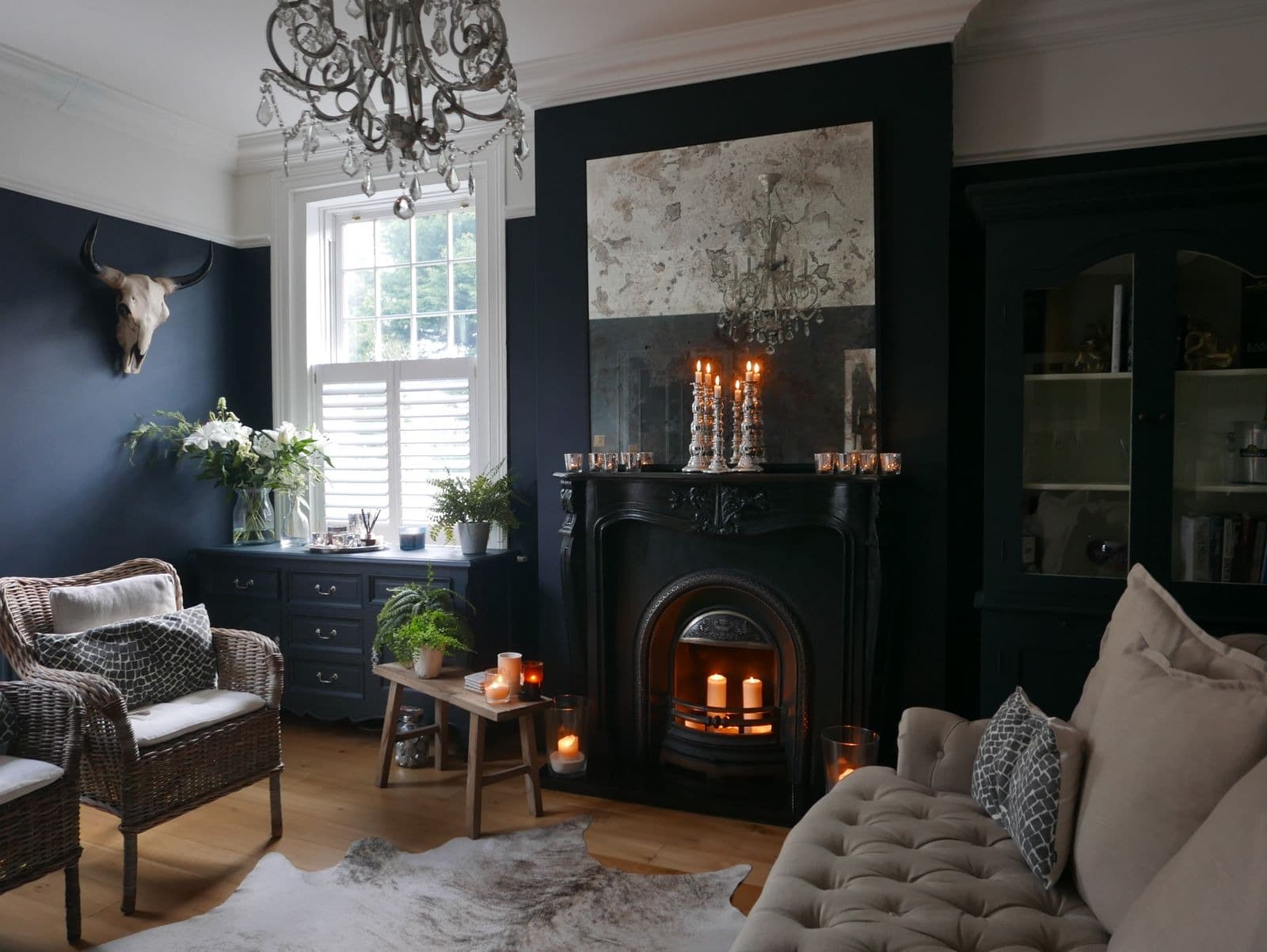 Classic sitting room with a fireplace, typical of the finished interiors Houston TV Installation works in around West University Place