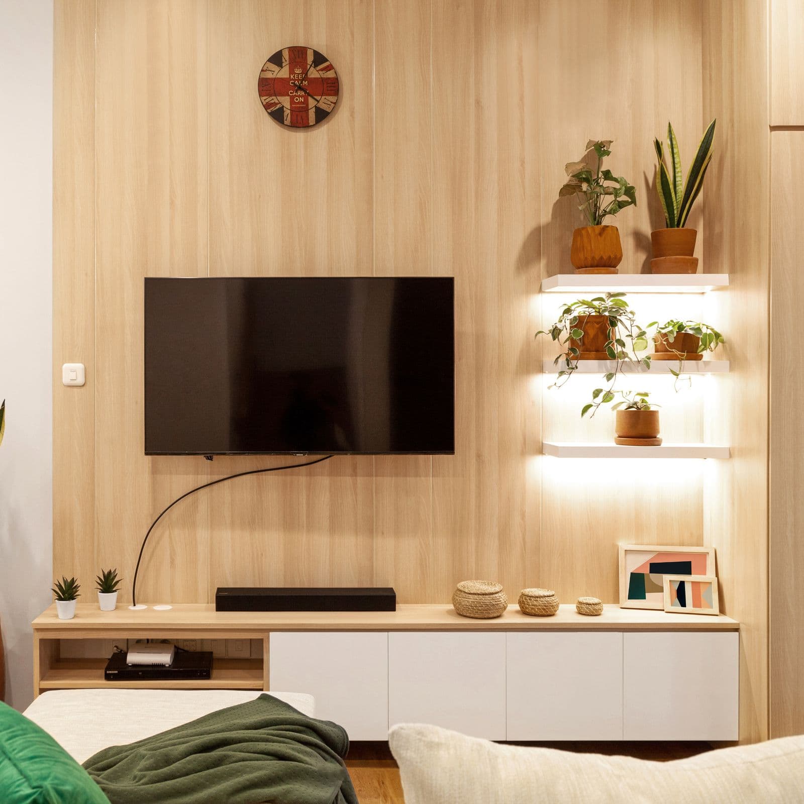 Warmly lit home interior in the evening, the setting a flush-mounted Samsung Frame TV is made for